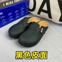 Black leather slippers