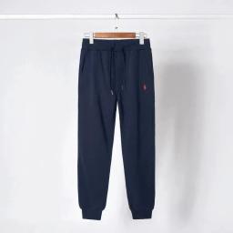 Blue pants with red label